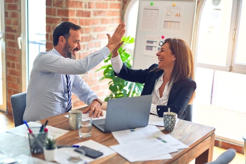 Certified Salesforce specialists collaborating on org strategy